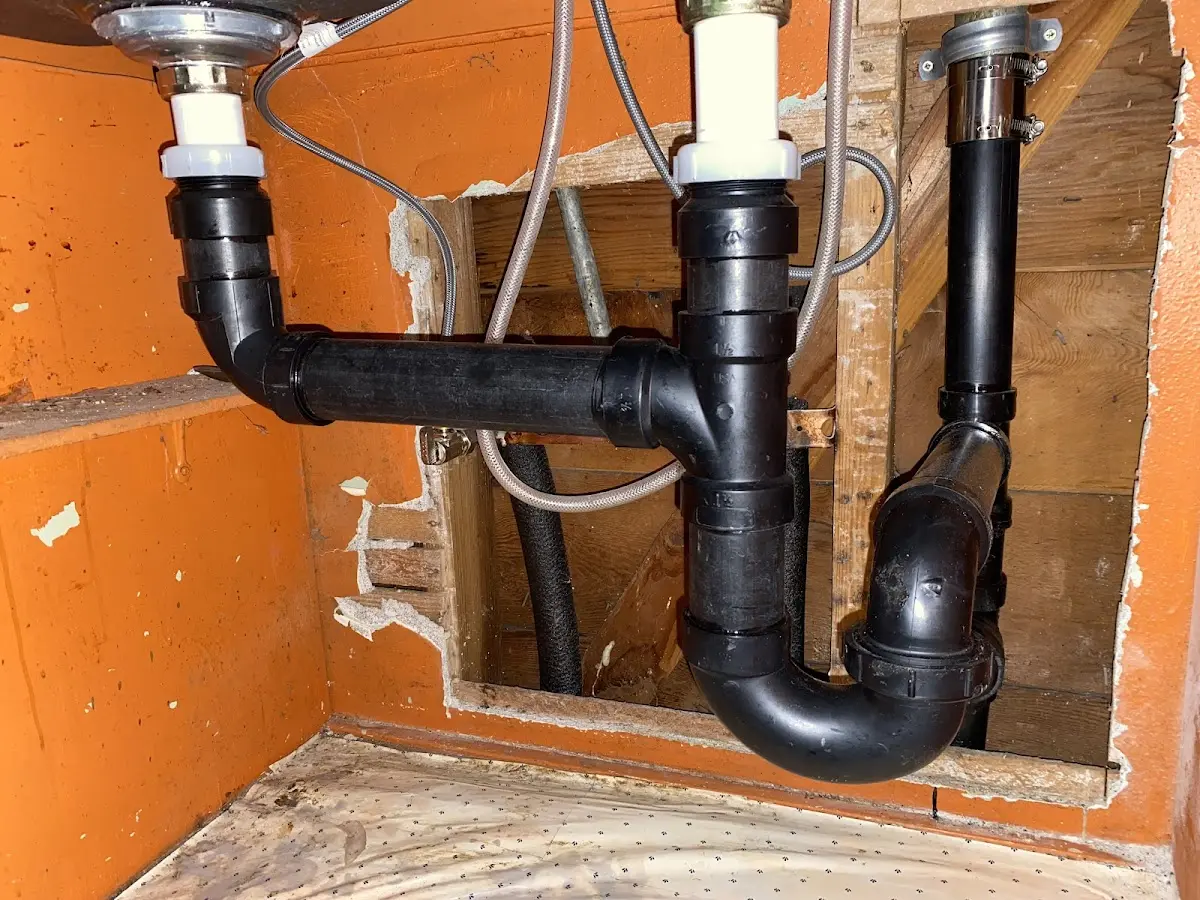 Professional Garbage Disposal Repair equipment and tools on the job in Wheeling